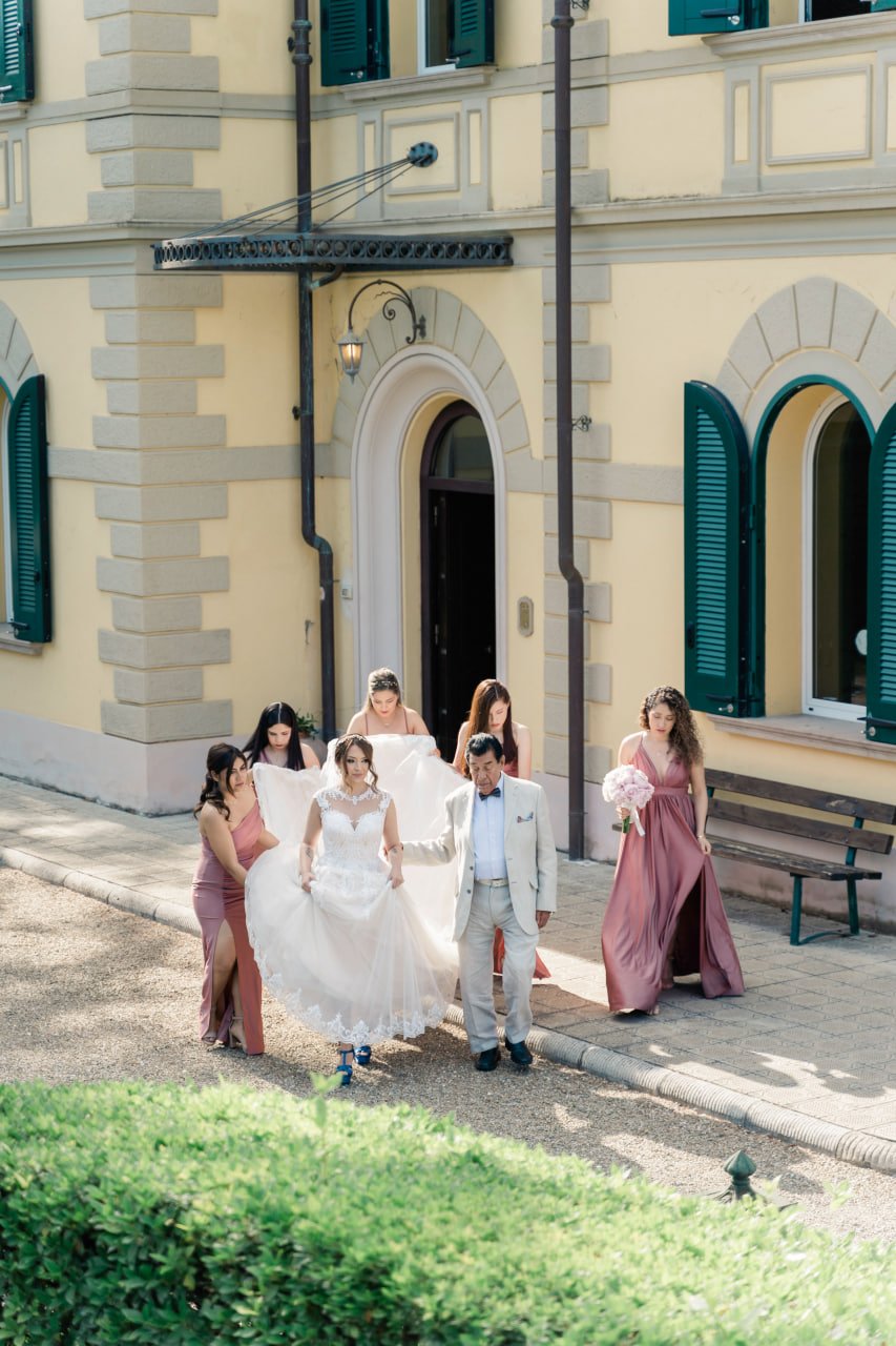 bride walk with bridesmaids