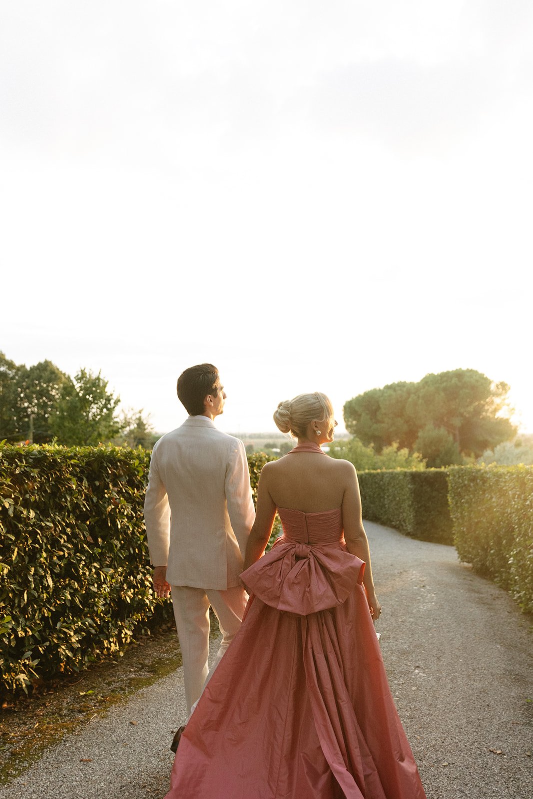 Couples relaxing in Tuscany villa garden